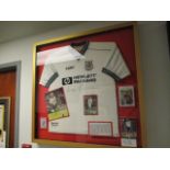 Tottenham Hotspur signed jersey and photos of Jurgen Klinsmann, 38in w x 37in hgt purchased at
