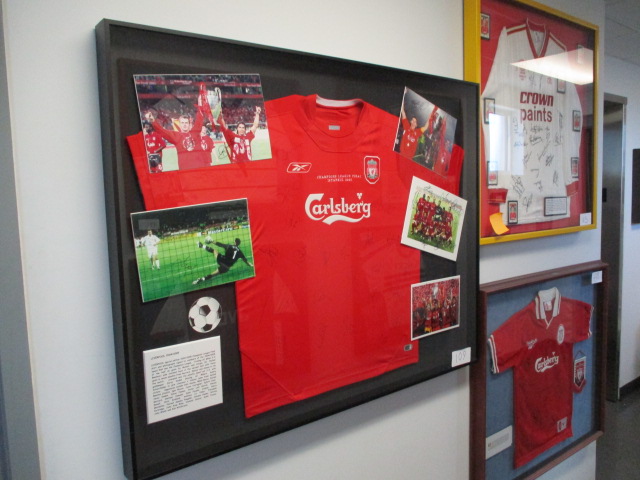 Liverpool special edition 04/05 Champions League Final shirt and photographs signed by members of