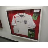 England National Team jersey and photos signed by Michael Owen 35in w x 32in hgt. Gifted to