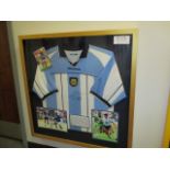 Argentina National Team replica shirt and 3 photographs signed by Diego Maradona, 36in x 36in ***