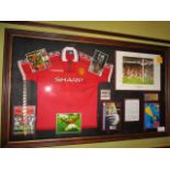 Manchester United treble winners, 1999 shirt and display, 72-1/2in w x 43-1/2in hgt red repilca