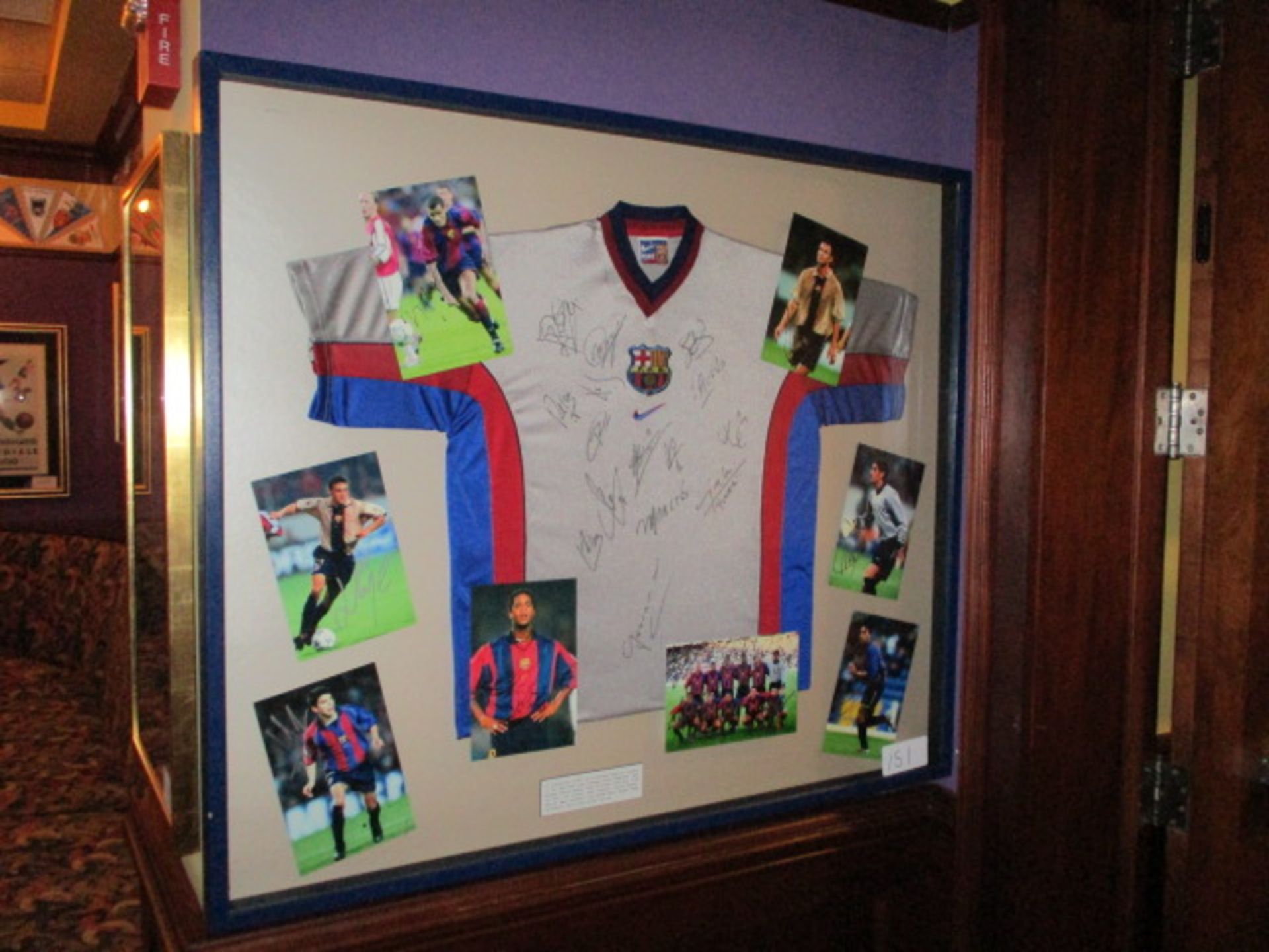 F.C. Barcelona 2001/02 signed jersey and 8 individual signed photos, 48in w x 41in hgt 15 signatures