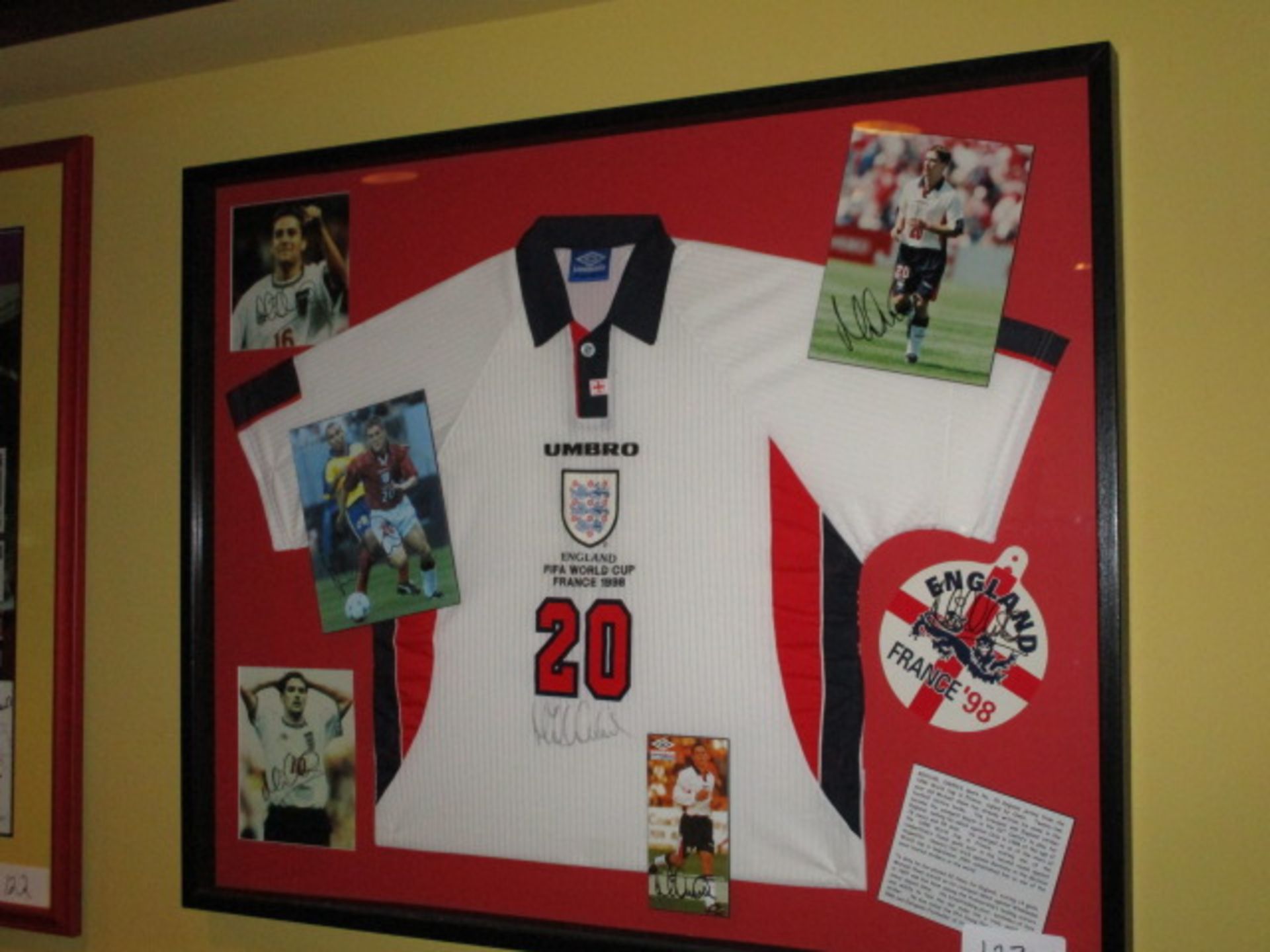 Michael Owen: a signed white No. 20 England 1998 England World Cup International jersey. This was