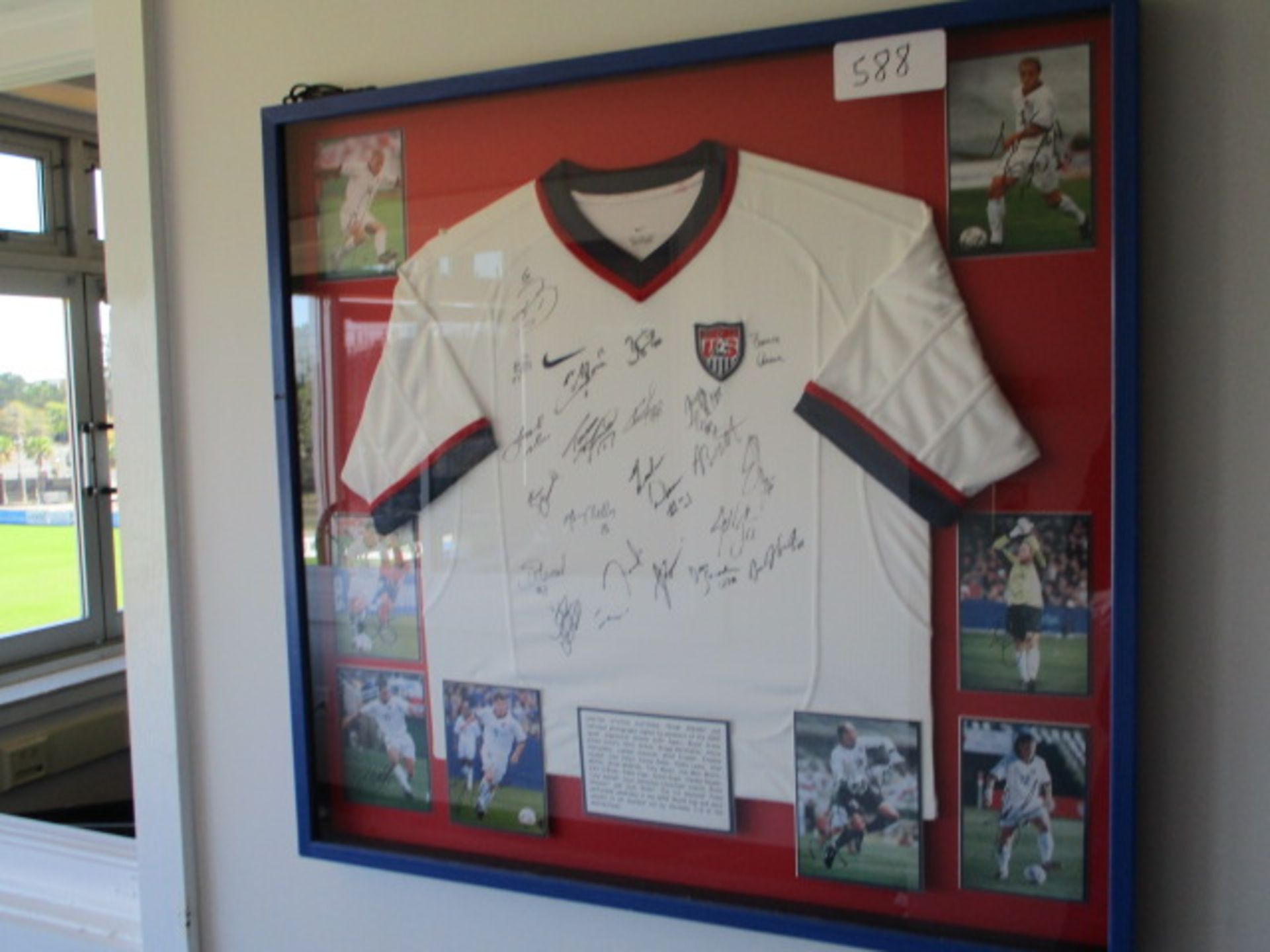 United States National Team signed jersey and photos of 2002 World Cup team, (36-1/2in w x 35in hgt) - Image 2 of 3