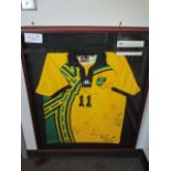 Jamaican National Team replica jersey, signed by 18 players who played in an international