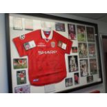 A limited edition Manchester United 1999 Champions League Winners jersey signed by 20 Manchester