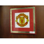 Manchester United framed team badge 15in x 15 ***Note from Auctioneer*** All items will come with an