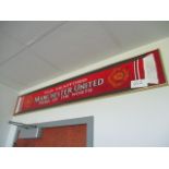 Manchester United scarf, 63in w x 10in hgt ***Note from Auctioneer*** All items will come with an