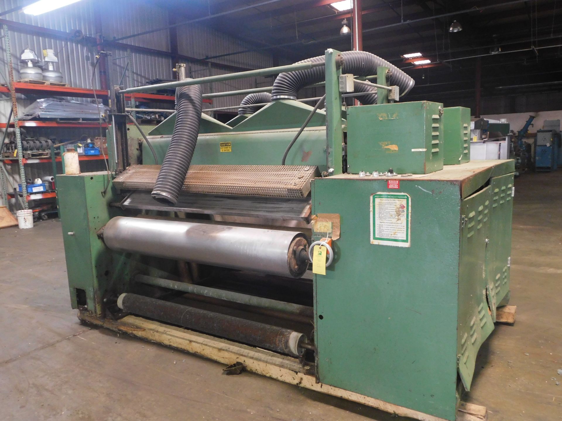 S.M.W Polishing Machine, Ser # BP509191, 2 HP, 180 Volts, Working Width 71", Good Condition, Rigging