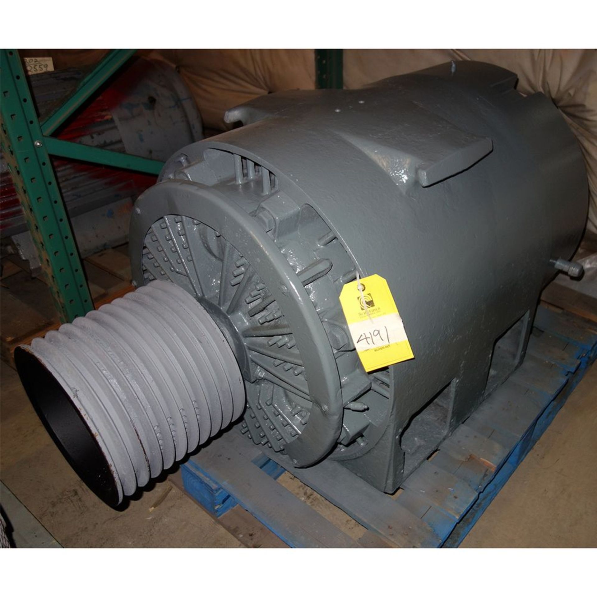 Located: Tyler, TX -- 100hp motor1200rpm 440V with 10 groove pulley ***Note from Auctioneer: Loading