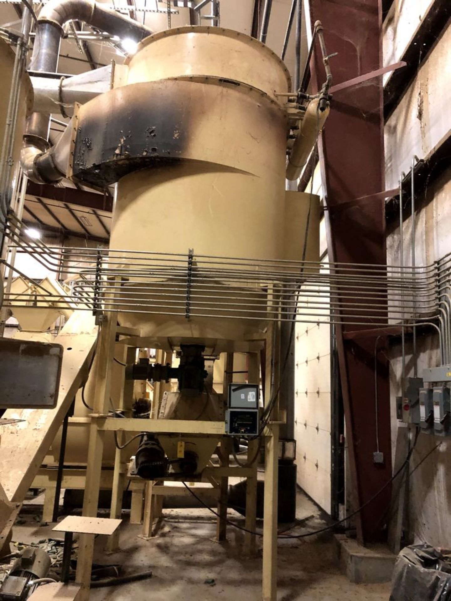 Located: Vincennes, IN -- Dust collector on legs with rotary valve, loading fee $200 ***Note from