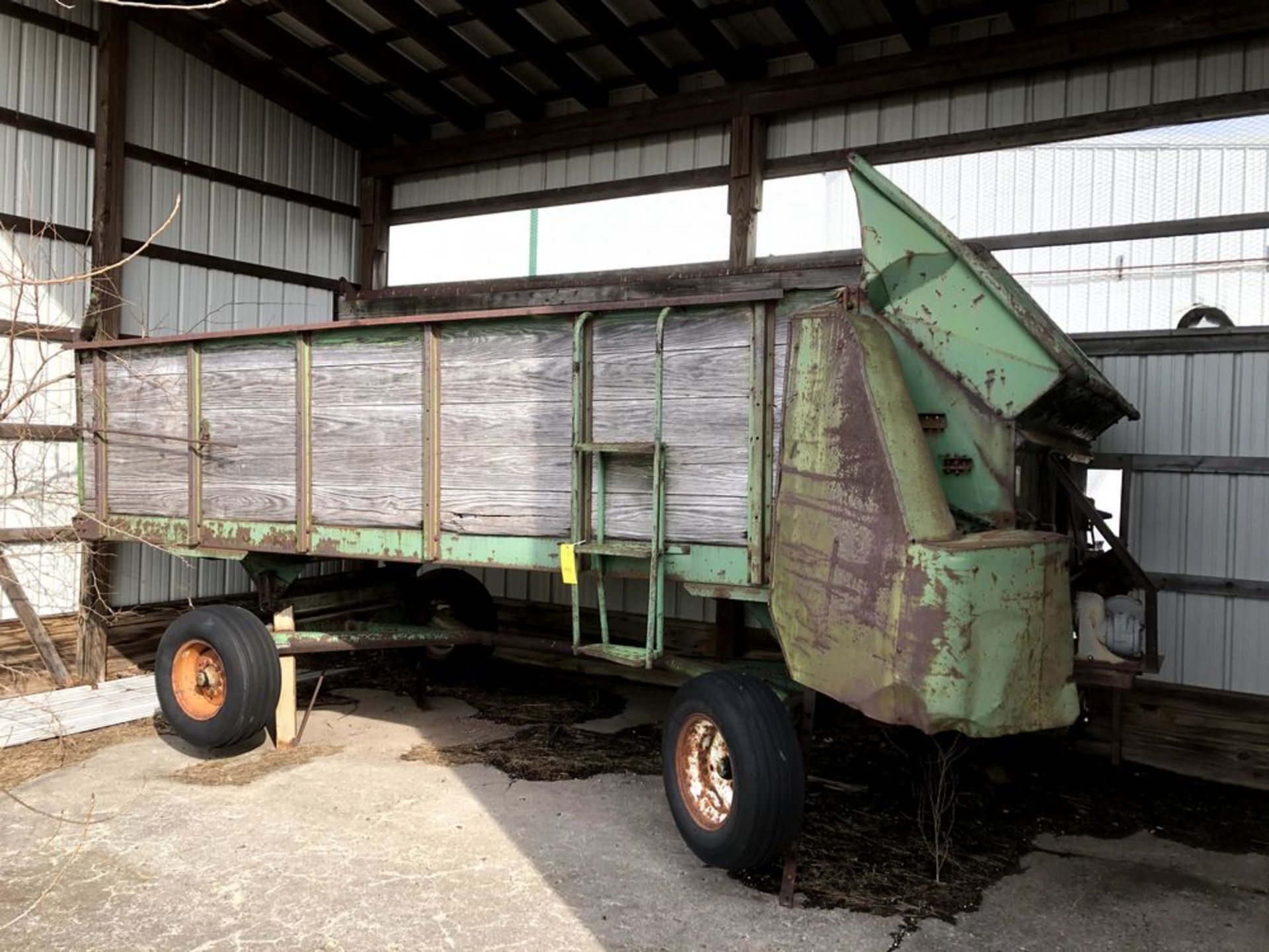 Located: Vincennes, IN -- Green feed wagon, loading fee $50 ***Note from Auctioneer: Loading Fees as