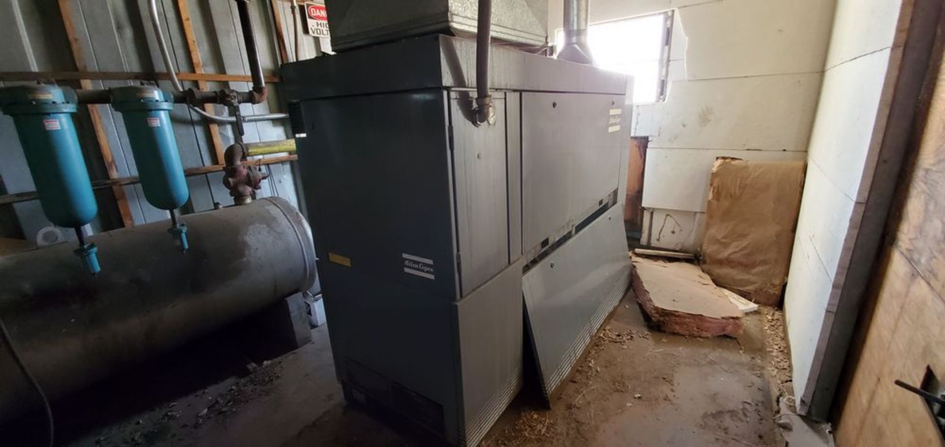 Located in Canon City, CO -- Atlas Copco GA55 Air compressor, $2500 Revomal, Rigging, and