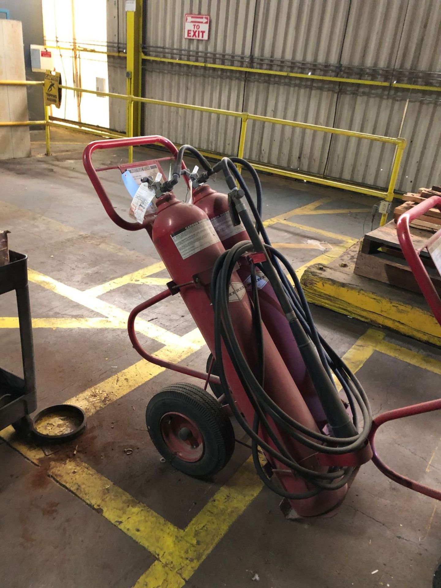 Carbon Dioxide Fire Extinguishers, 1 pair on metal rolling cart, Type BC, Size IV Model 324