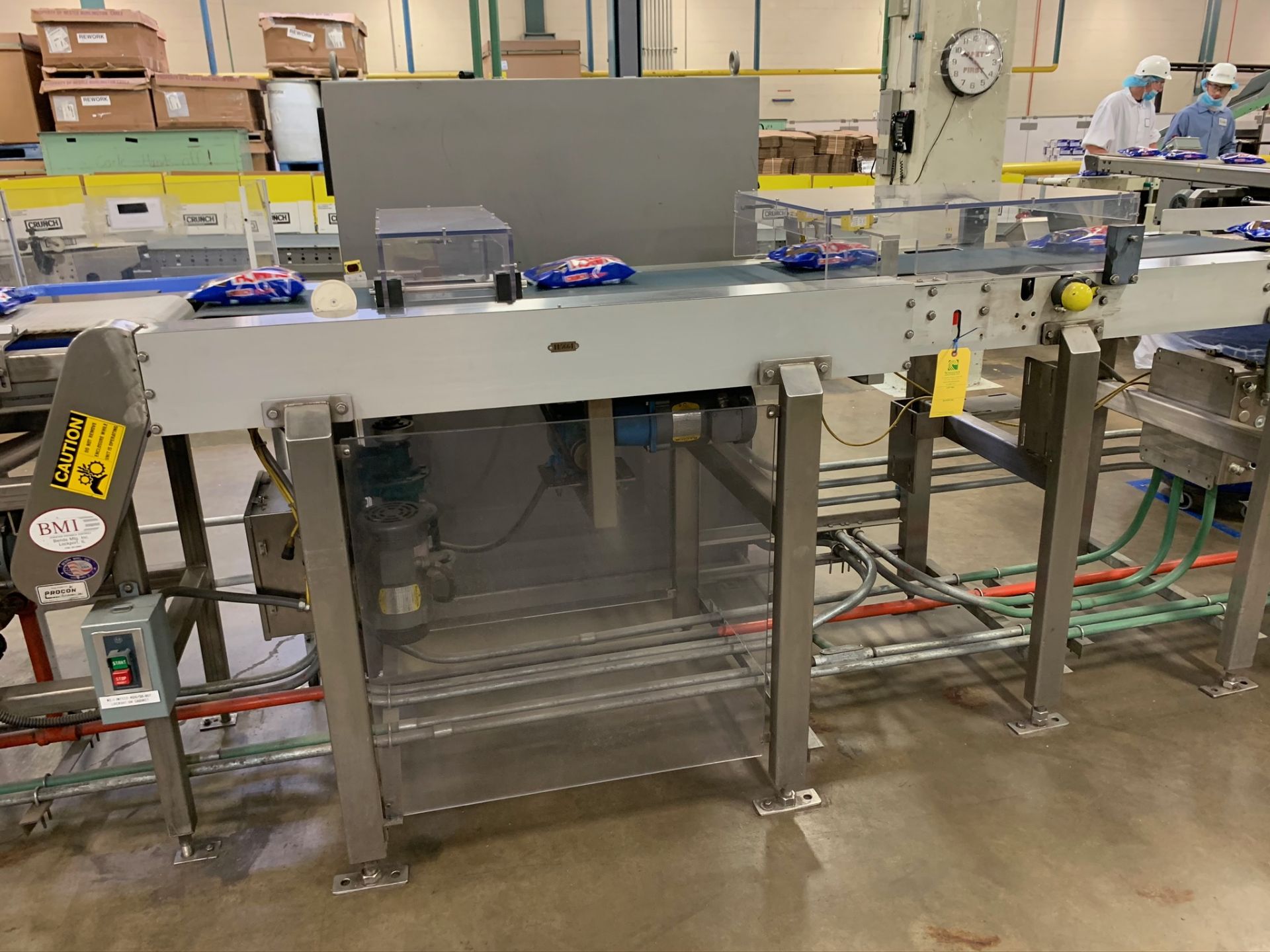 (Located in Burlington WI) Timing Conveyor. RIGGING FEE: $2000