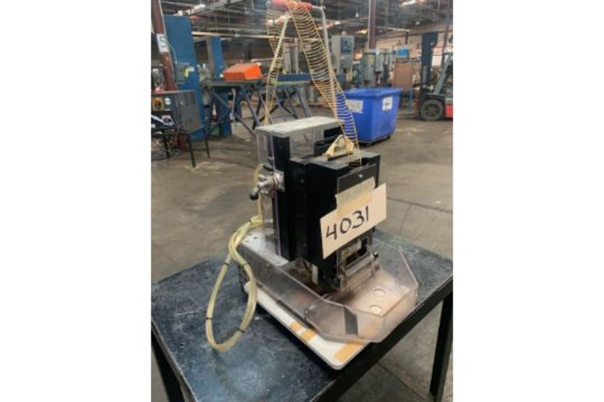 MDM in Tag Attaching Machine Model VNS with Guard. Serial J 11000137, Rigging Fee: $25