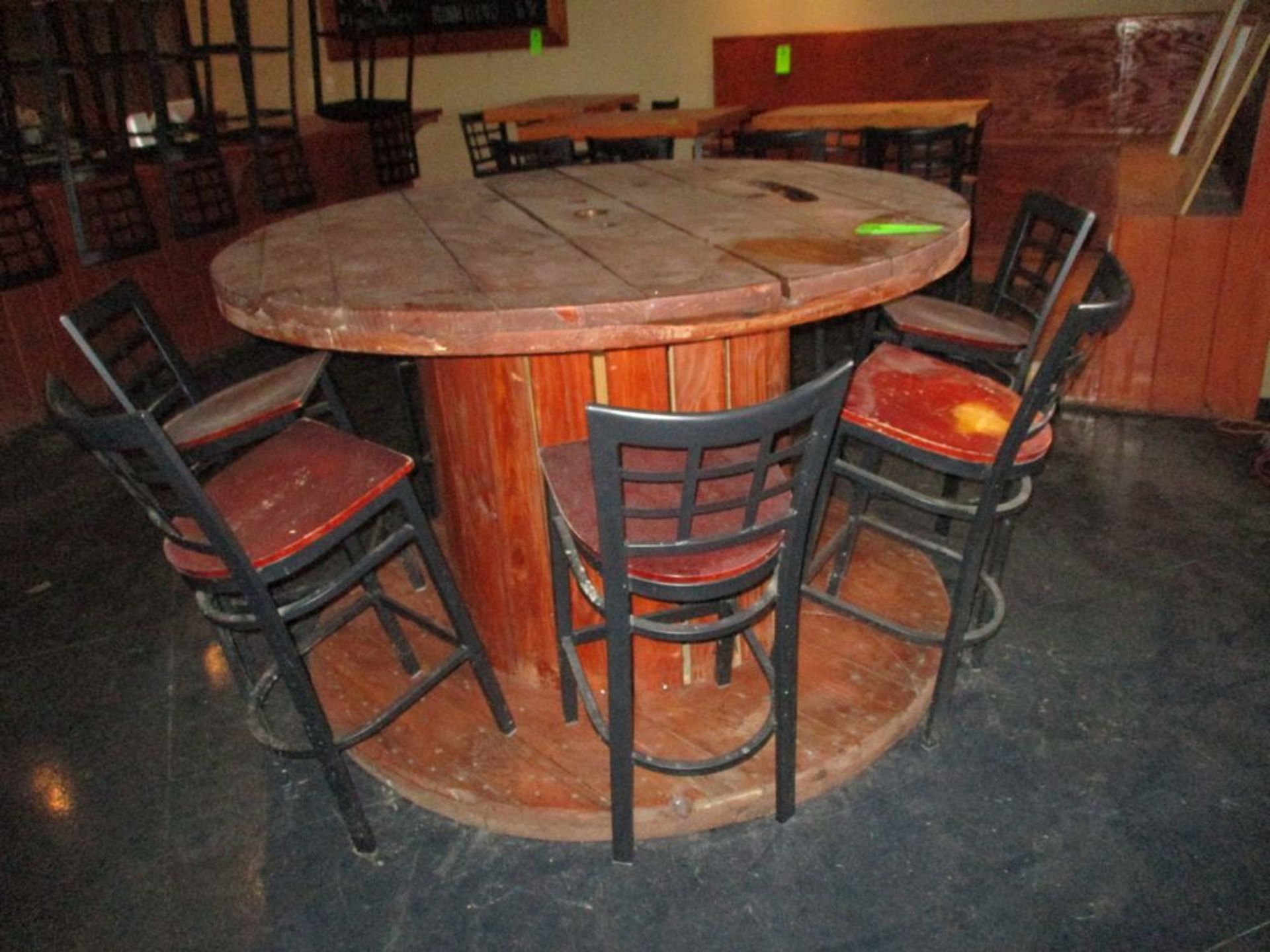 Wood round table with 7 chairs, 67 in dia x 44 in hgt ***Auctioneer Note*** -- $150 Removal &