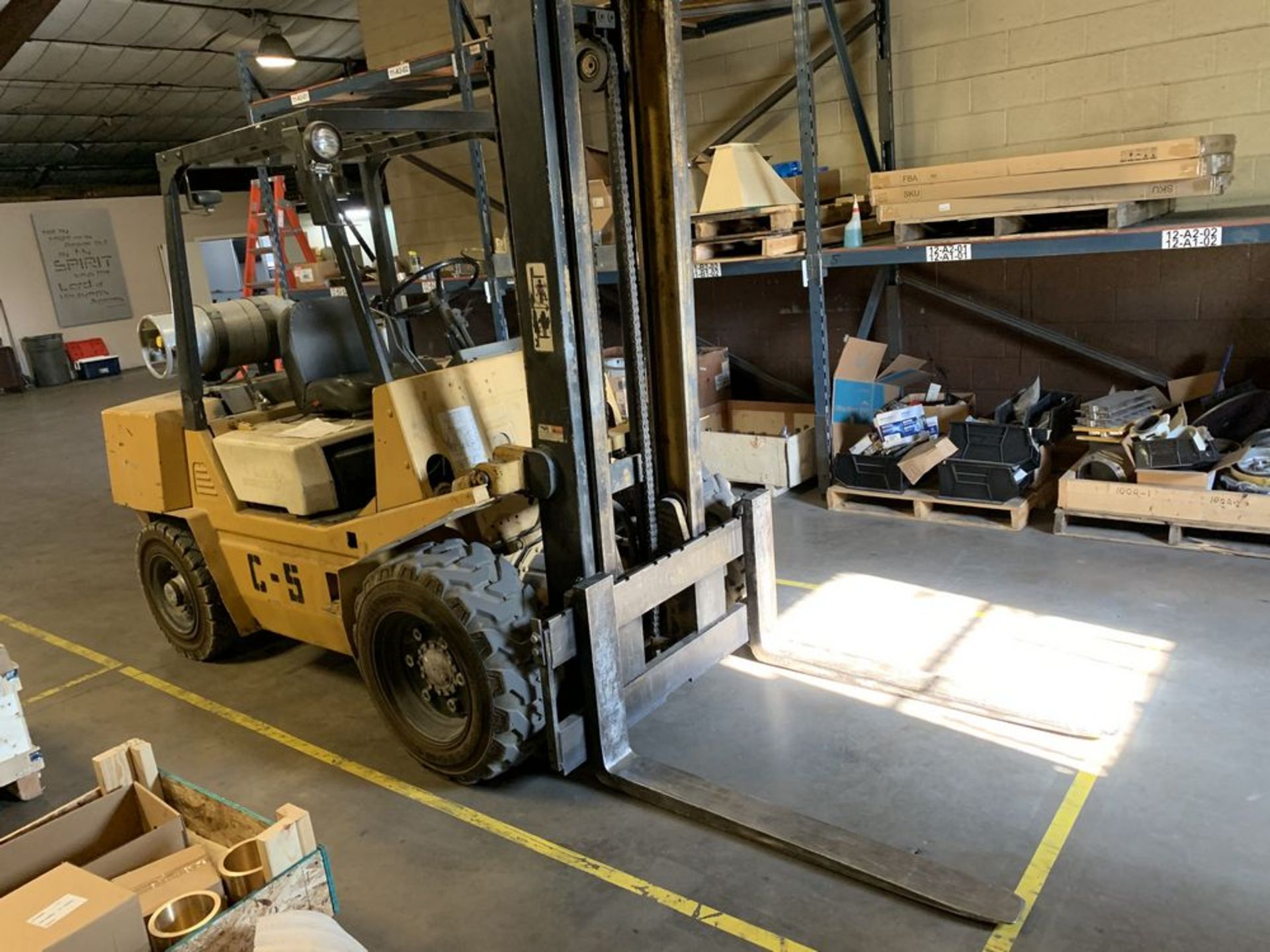 Located in Canon City CO: TCM Forklift, 8,000lbs, lp, approx 6' forks, currently underpower and in