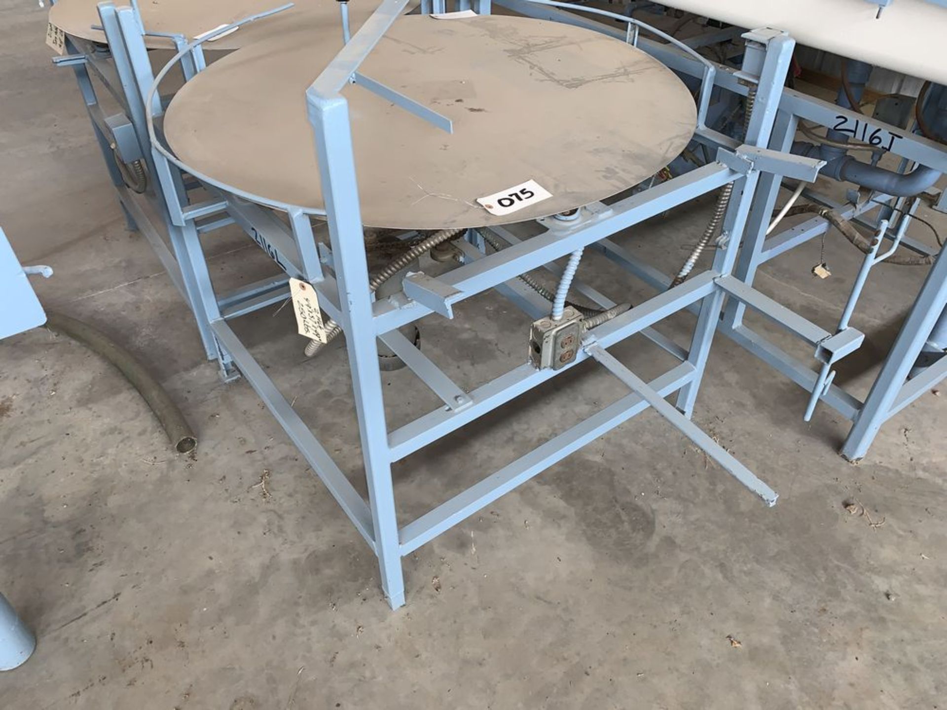 Located in Canon City CO: Rotary Table, accumulation table, lazy susan with stainless steel top