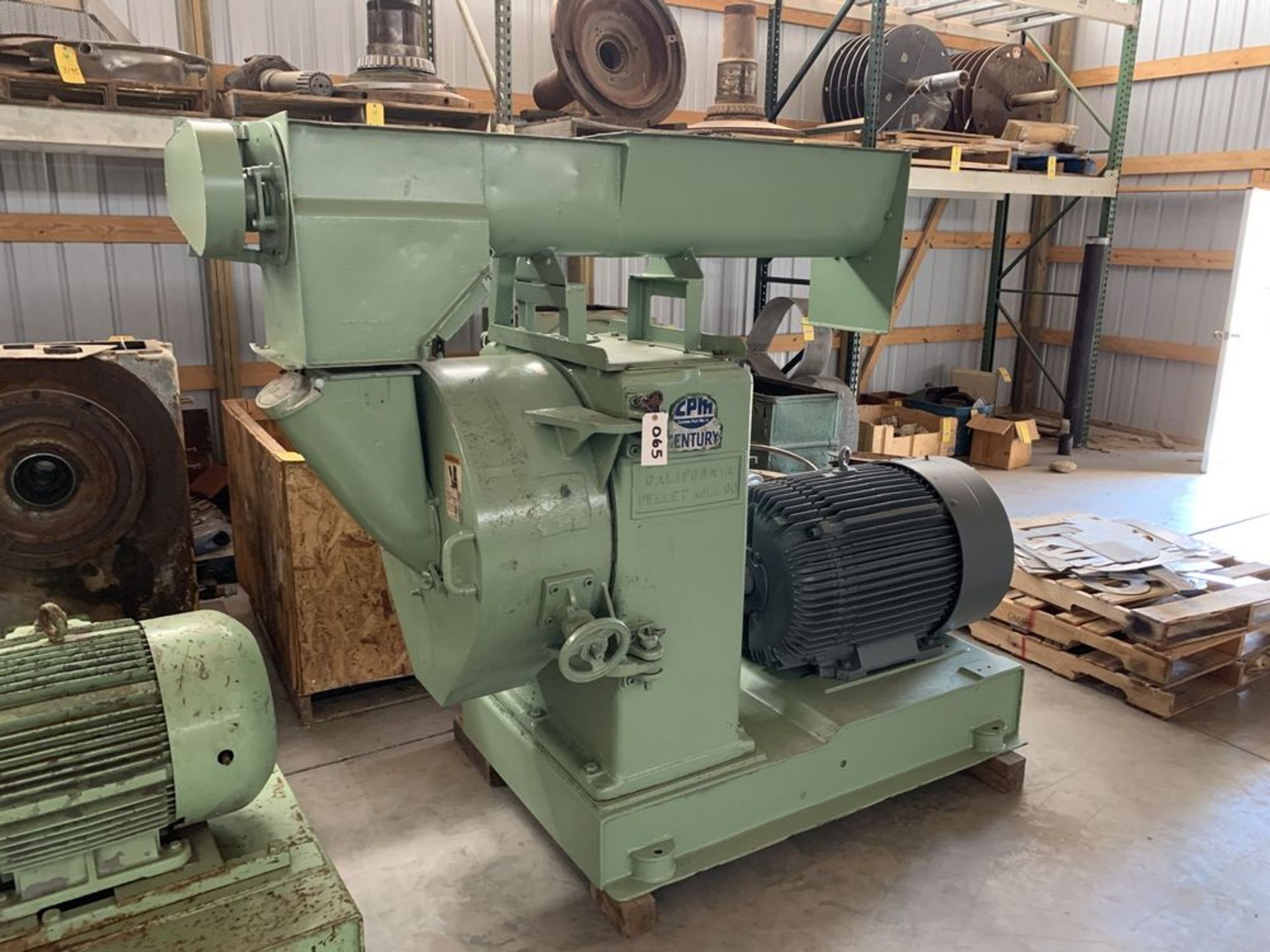 Located in Canon City CO: CPM Century pellet mill with 100hp motor screw feeder, feed chute, door, 2