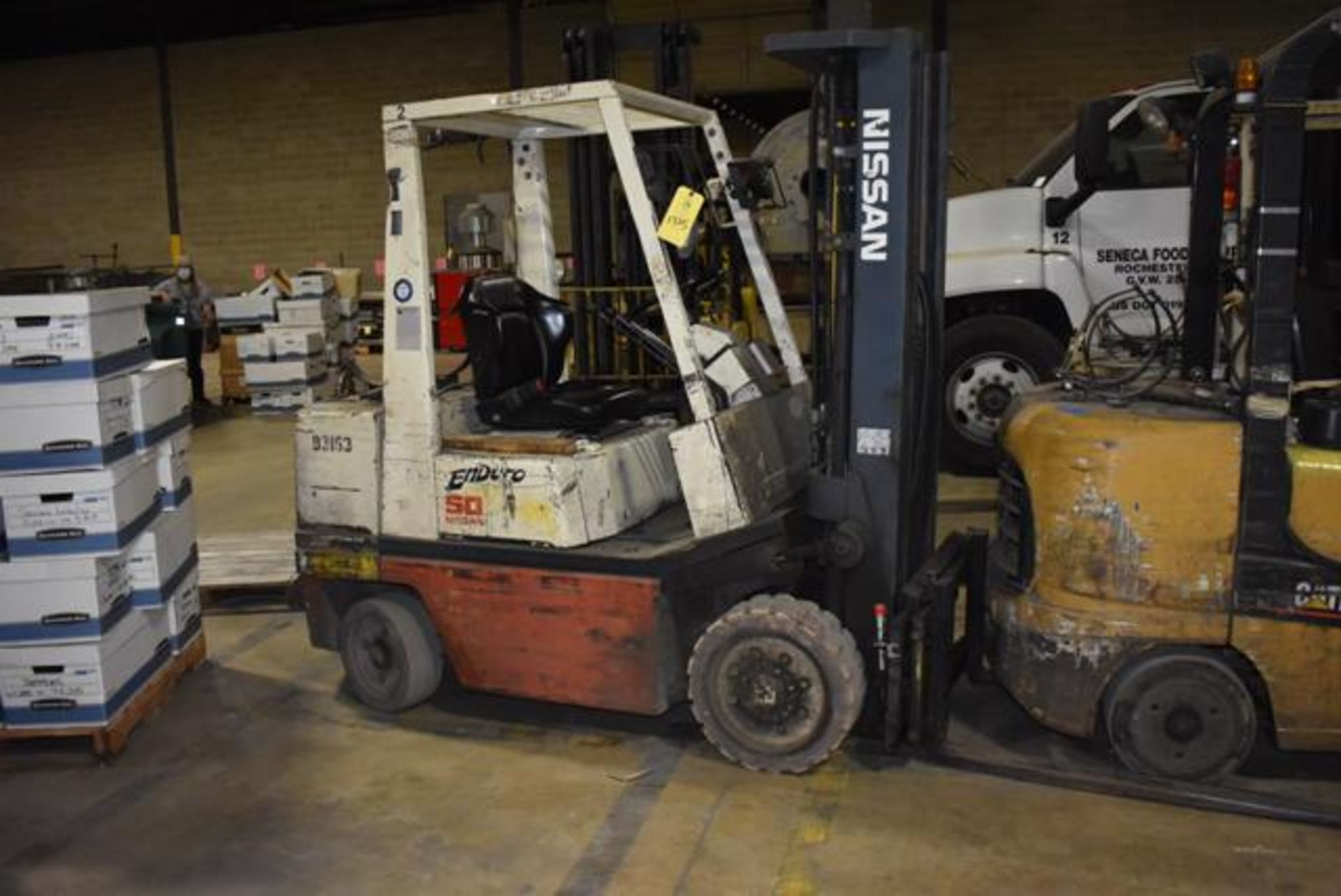 (Located in Rochester, MN) Nissan Enduro 50 Forklift, Propane, Cushion Tires, Side Shift, ROPS