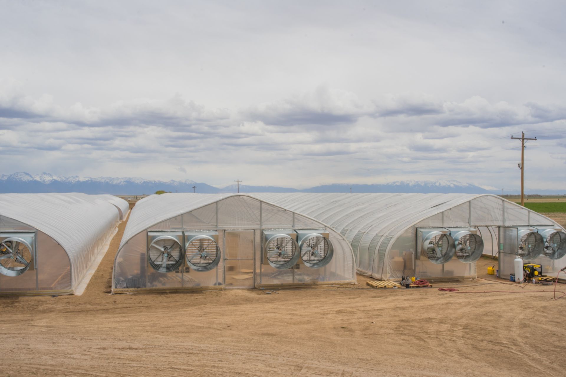 Scenic Acres Greenhouse Mfg Greenhouse w/ Four Exhaust Fans and Two Heaters, 34' x 200' gothic hoop
