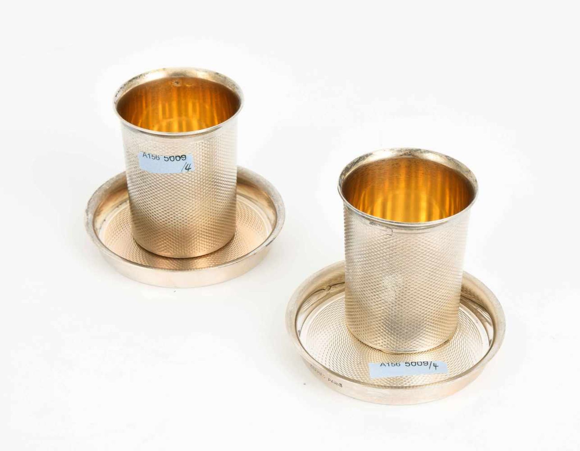 Lot: Becher und Untersetzer, Hermès<