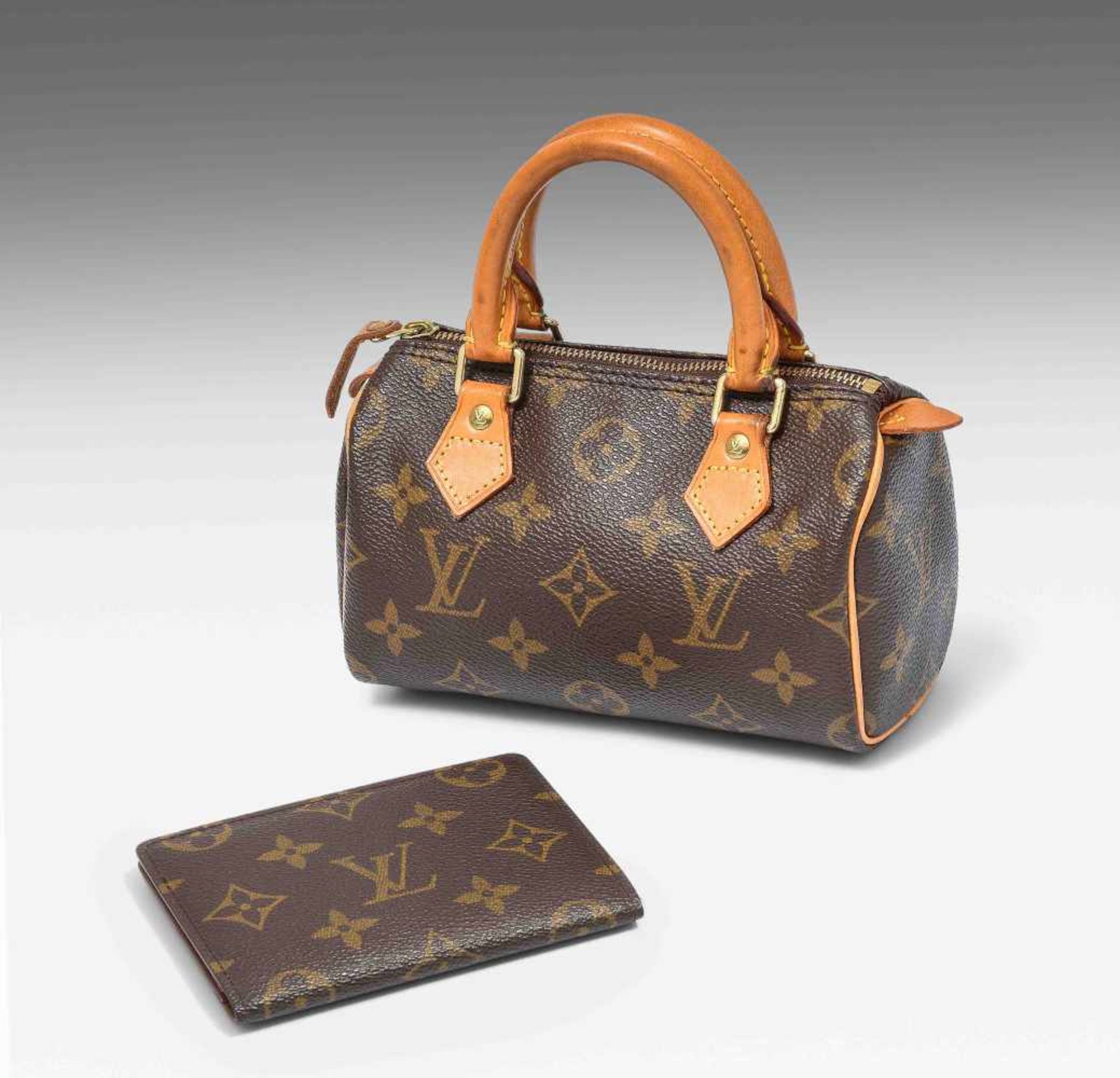 Louis Vuitton, "Mini sac HL"Mini Speedy aus Mongram Canvas. Reissverschluss. 16x10x7 cm. Mit