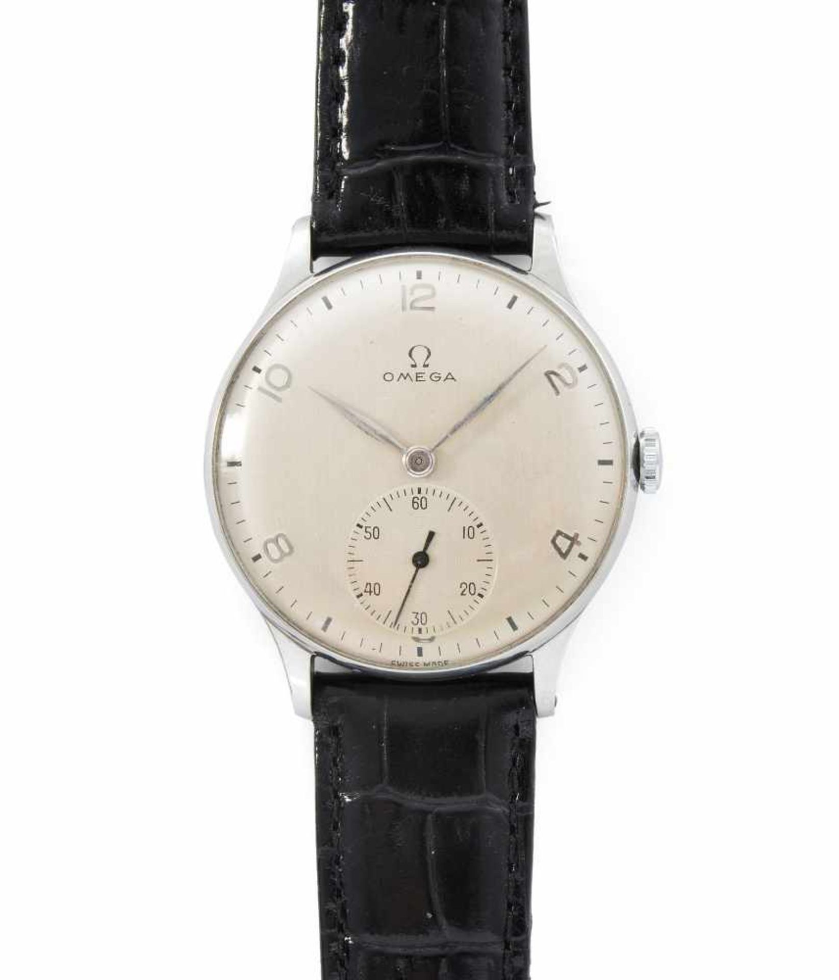 OmegaRunde, mechanische Armbanduhr 1954 mit Handaufzug in Edelstahlgehäuse. Boden gedrückt,