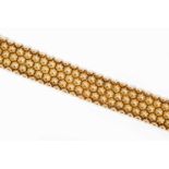 Gold-Bracelet750 Gelbgold. Fantasie-Muster. L 18,5 cm, B 2,4 cm , 61,8 g.