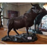 A Bronze Figure of a Bull in a serious stance. 32cm.