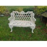 A Cast Iron Bench with horseshoe effect back.