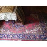 A large Persian Carpet with all over decoration and multi borders. 300 x 2.5m.