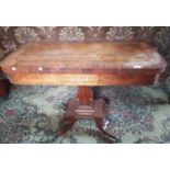 A fabulous Regency Rosewood Foldover Card Table, highly inlaid with brass inlay on platform base and