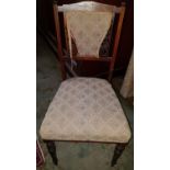 An Edwardian Rosewood and Inlaid Chair.