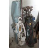Two sets of Golf Clubs along with two trolleys.