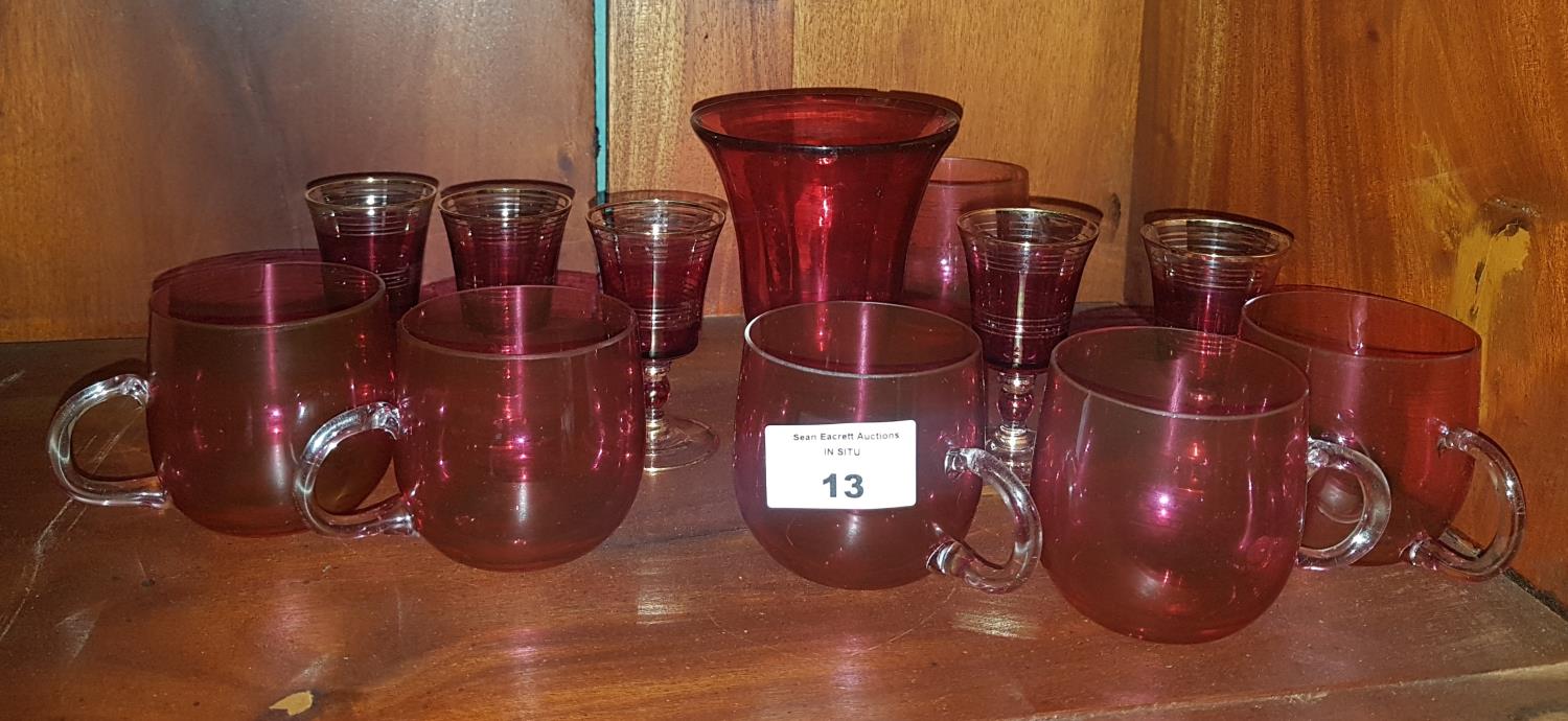 A quantity of Cranberry Glass items.