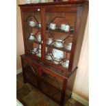 A Regency Mahogany low glazed two door Bookcase H152 x W101 x D34.