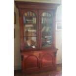 A really good Victorian Mahogany two door Bookcase with glazed upper section and panelled arch