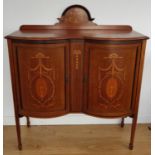 A good Edwardian Mahogany and Inlaid Double Bow Fronted Cabinet. W118 x H128 x D42 cms.