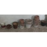 A quantity of terracotta and other Flower Pots.