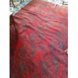 A large Burgundy Ground Rug with all over decoration. 320 x 226cm.