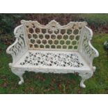 A Cast Iron Bench with horseshoe effect back.