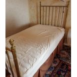 A 19th Century Brass Bed.