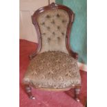 A lovely 19th Century Mahogany show frame Ladies Chair with deep buttoned back.