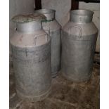 Three Aluminium Milk Churns.