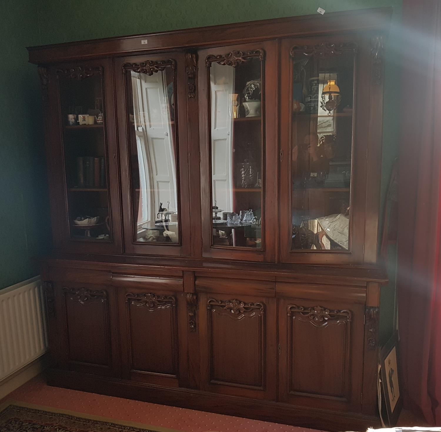 A very large Mahogany four door Bookcase with a glazed top and panelled door base. 212 L x 216 H x - Image 3 of 3