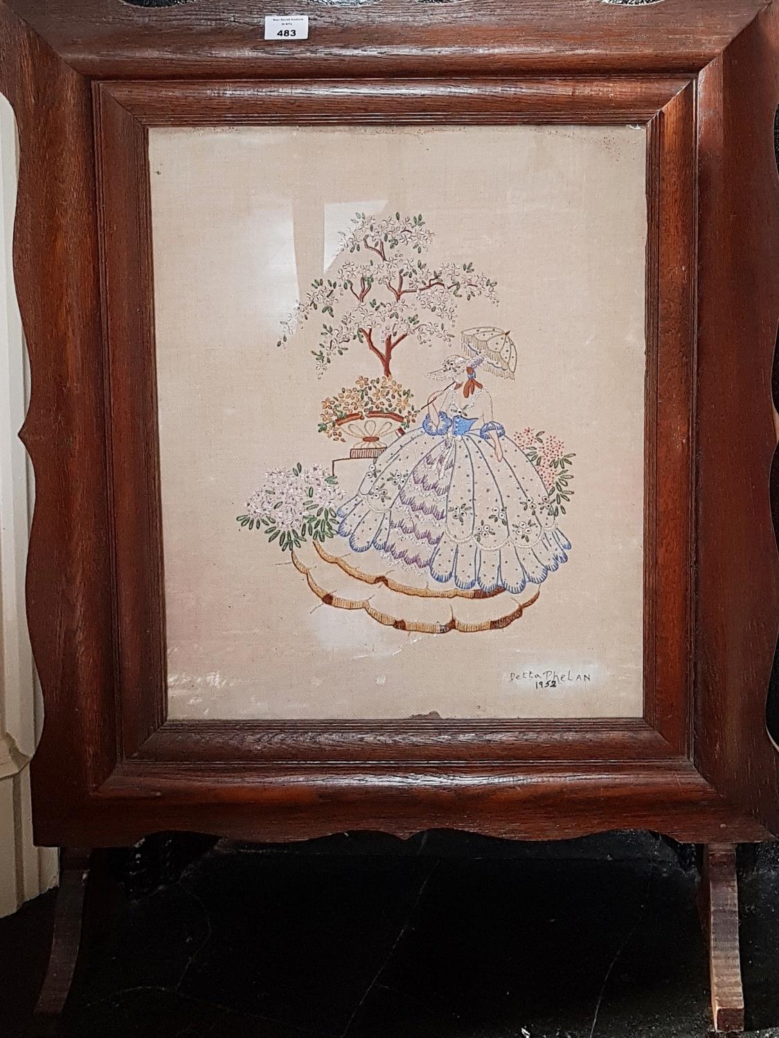 A 19th Century Firescreen with needlepoint centre. 63 x 87cm.