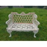 A Cast Iron Bench with horseshoe effect back.