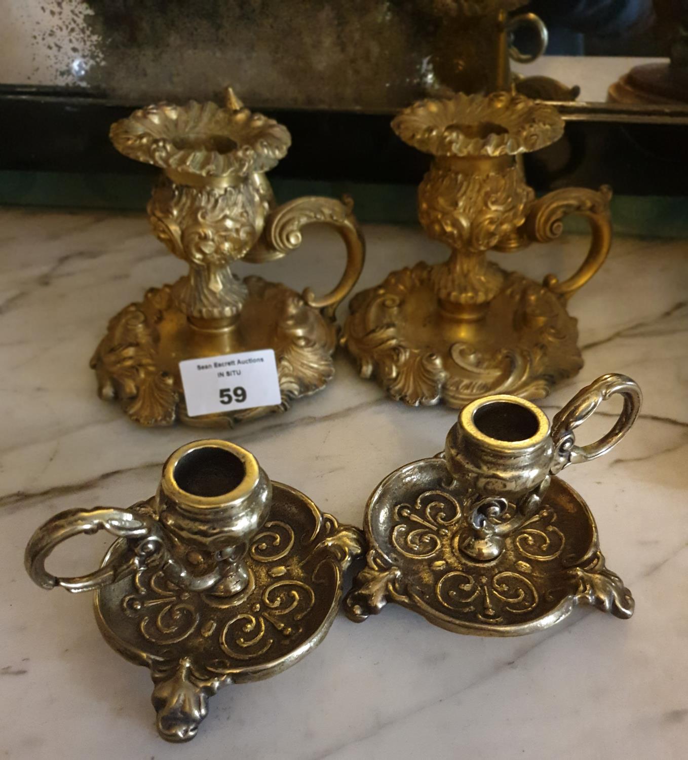 A lovely pair of 19th Century Ormolu Night Candlesticks with Extinguishers.